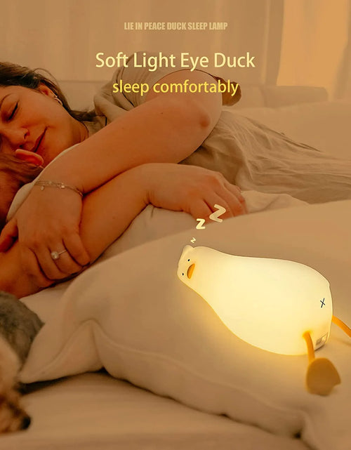 Load image into Gallery viewer, Lying Flat Duck Night Light, LED Squishy Duck Lamp, Cute Light up Duck, Silicone Dimmable Nursery Nightlight, Rechargeable Bedside Touch Lamp for Breastfeeding, Finn the Duck.
