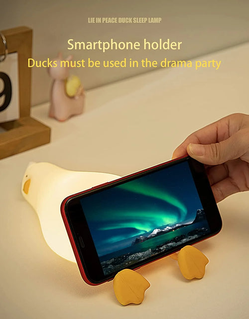 Load image into Gallery viewer, Lying Flat Duck Night Light, LED Squishy Duck Lamp, Cute Light up Duck, Silicone Dimmable Nursery Nightlight, Rechargeable Bedside Touch Lamp for Breastfeeding, Finn the Duck.
