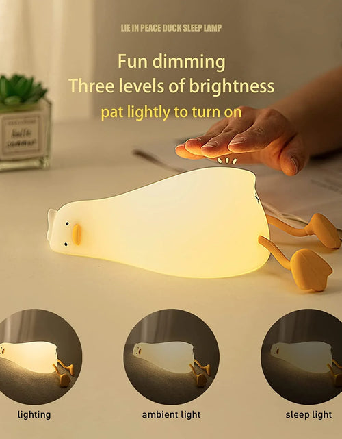 Load image into Gallery viewer, Lying Flat Duck Night Light, LED Squishy Duck Lamp, Cute Light up Duck, Silicone Dimmable Nursery Nightlight, Rechargeable Bedside Touch Lamp for Breastfeeding, Finn the Duck.
